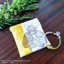 【グッズ-セットもの】BANANA FISH 京くみひもブレスレット&バネ口ポーチ アッシュ・リンクス【再販】の画像